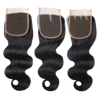 Les extensions de cheveux humains sont des paquets avec fermeture en dentelle.